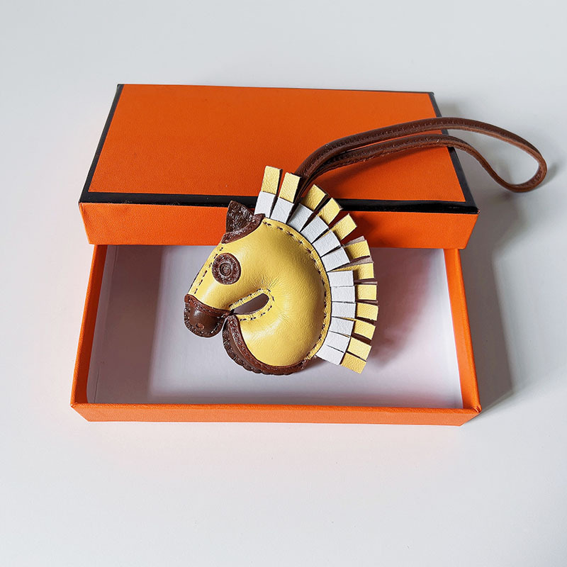 Handsewn unicorn pendant